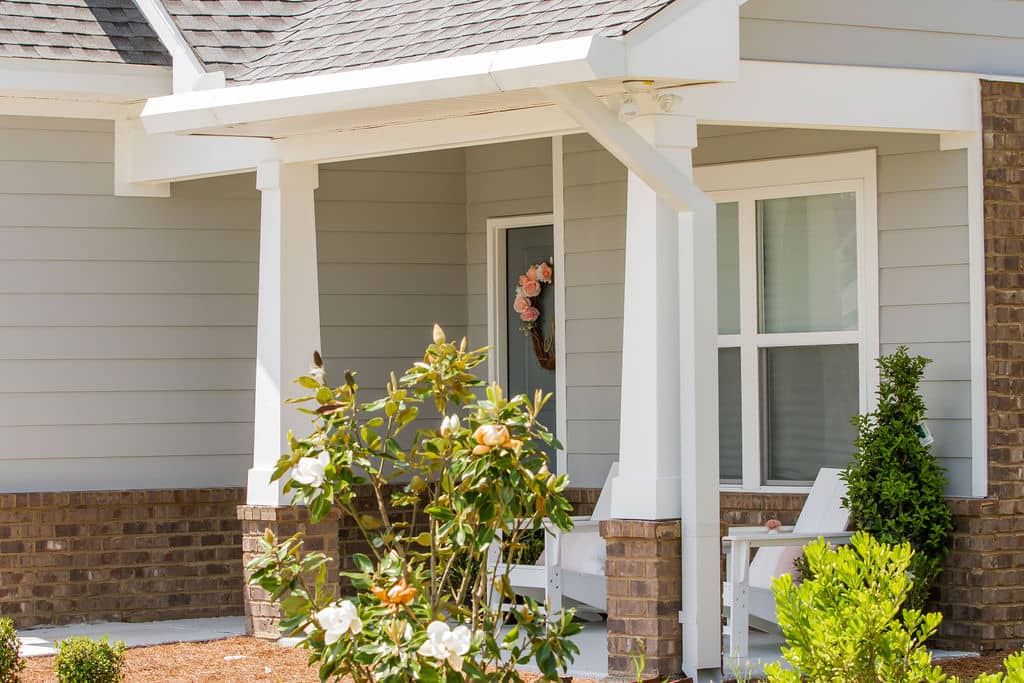elegant seamless gutters at the entrance of a Florida home